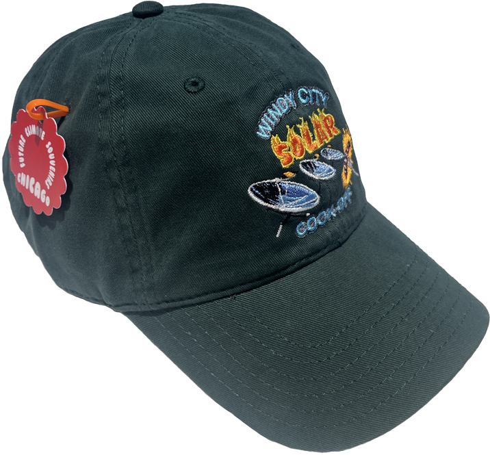 Dark green baseball cap embroidered with an illustration showing satellites powering a skillet cooking sausages underneath sunlight, with a  cooked sausage on a fork in the foreground. Text reads “Windy City Solar Cook-Off.”