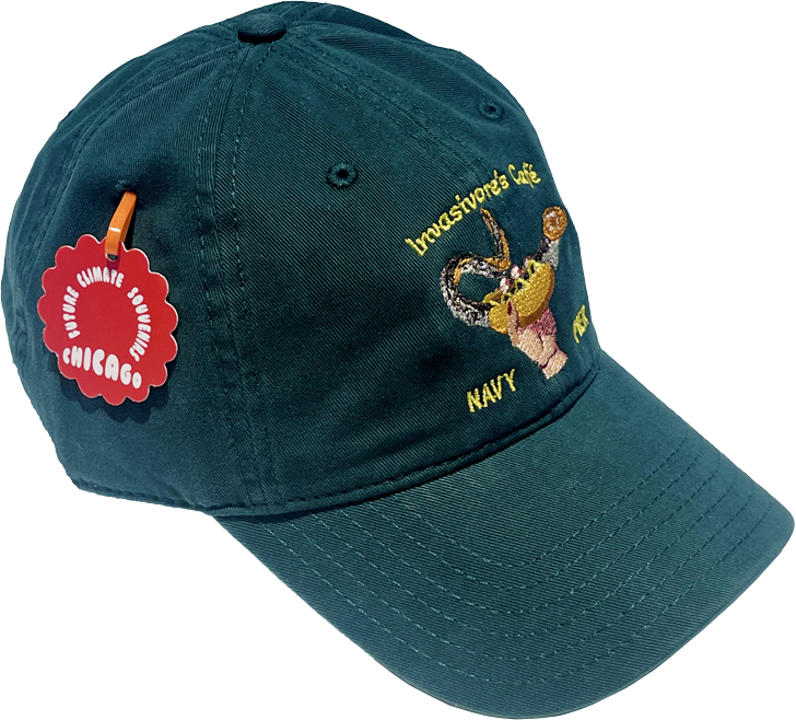 Dark green baseball cap embroidered with an illustration showing satellites powering a skillet cooking sausages underneath sunlight, with a  cooked sausage on a fork in the foreground. Text reads “Windy City Solar Cook-Off.”